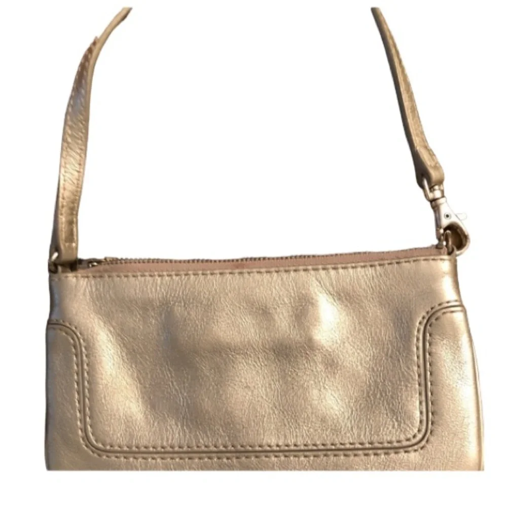 Coach  silver metallic genuine leather large wristlet or clutch 9” long  …